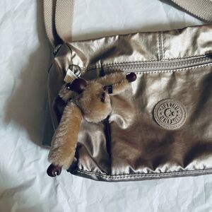 Kipling brand gold color crossbody bag